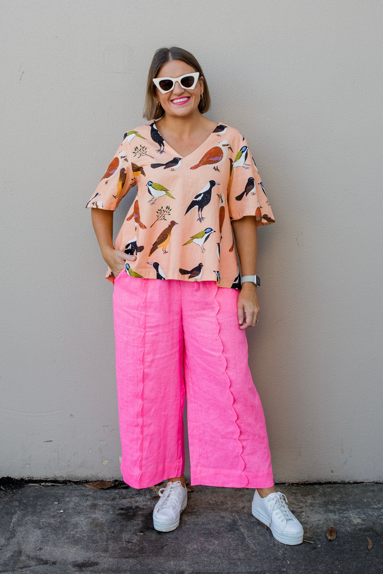 Ruffle Your Feathers (peach) swing top