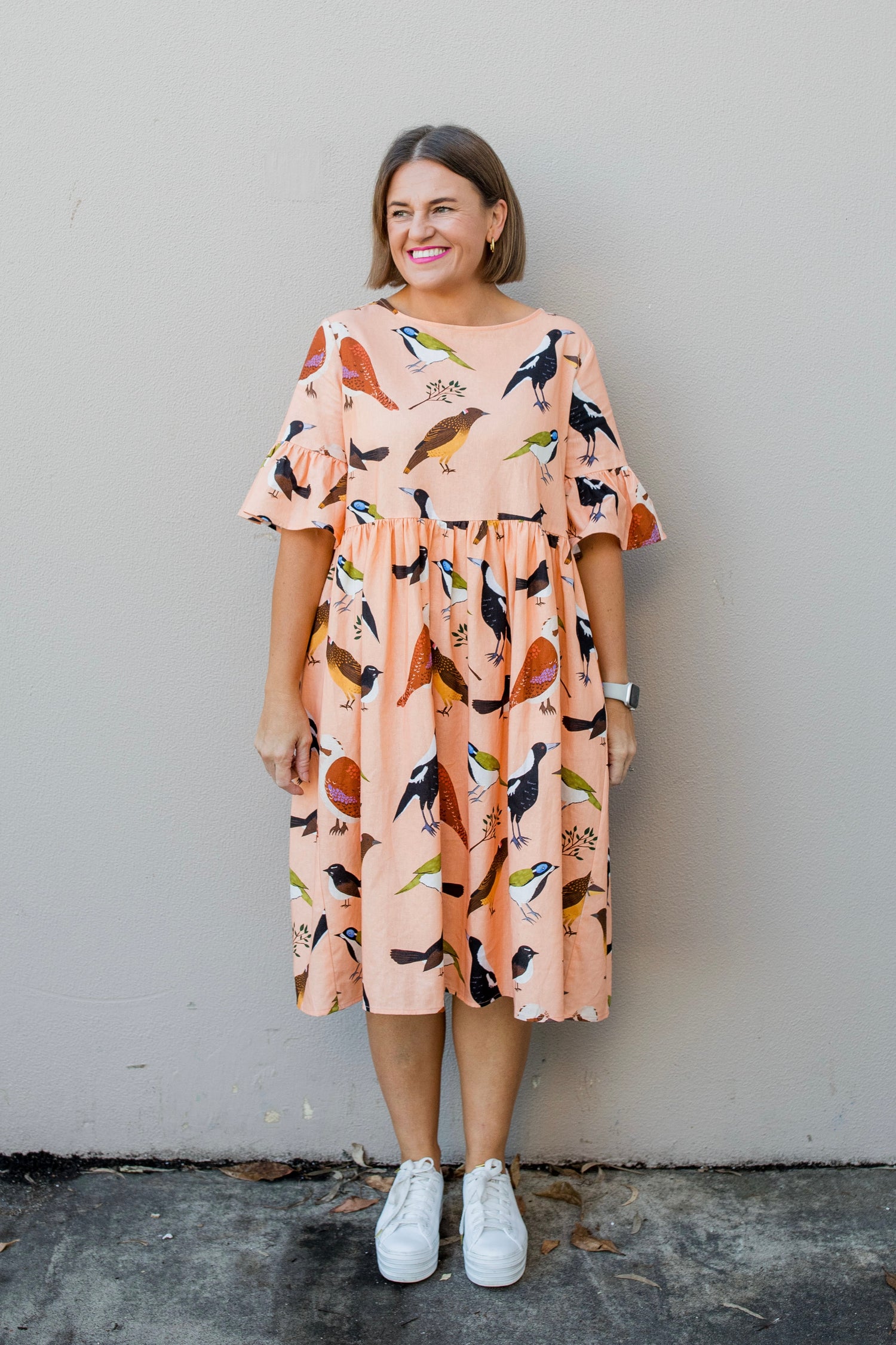 Ruffle Your Feathers (peach) ruffle smock dress