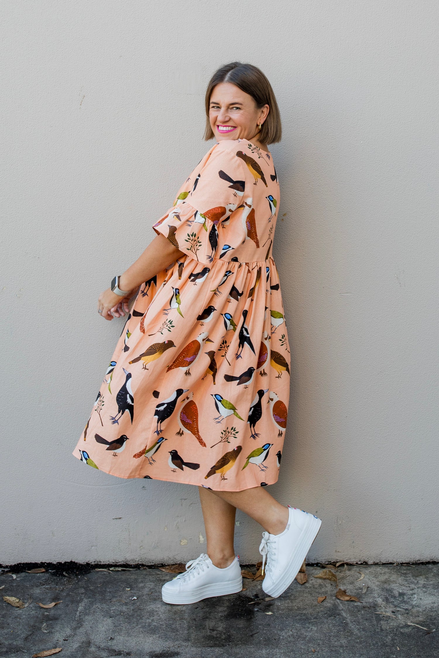 Ruffle Your Feathers (peach) ruffle smock dress